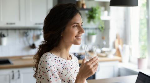 woman staying hydrated